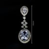 Oval Shaped Diamond Danglers - White Stoned Earrings - American Diamond Jewellery
